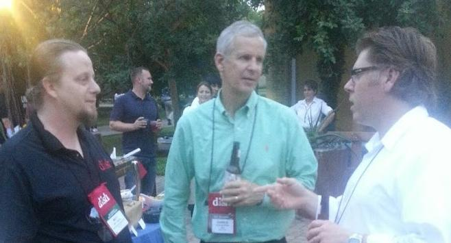 Discussing business with Charlie Ergen, Founder of DISH Network